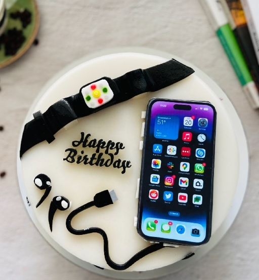 Một chiếc bánh kem trang trí điện thoại iphone 14